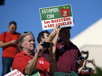 Teachers and supporters of public education march against education funding cuts during the March for Public Education in Los Angeles, Calif...