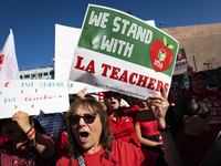 Teachers and supporters of public education march against education funding cuts during the March for Public Education in Los Angeles, Calif...