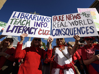 Teachers and supporters of public education march against education funding cuts during the March for Public Education in Los Angeles, Calif...