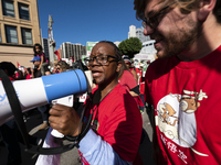 Teachers and supporters of public education march against education funding cuts during the March for Public Education in Los Angeles, Calif...