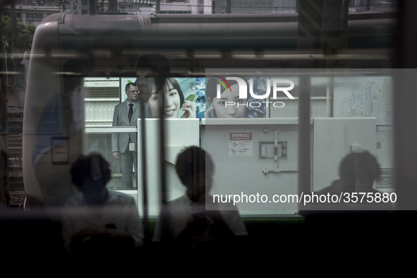 Michele Becattini in Tokyo during he takes the subway to go to Hamamatsu to meet his son who was kidnapped by his maternal grandparents. He...