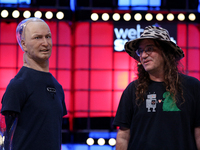 Chief Scientist of Hanson Robotics / Founder & CEO, SingularityNET, Ben Goertzel (R ) and Han The Robot speak during the Web Summit 2018 in...