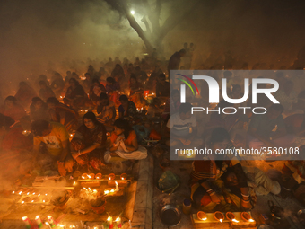 Hindu Devotees celebrating Rakher Upobas, sitting together in an old temple on last day in Narayanganj, Bangladesh, November 13, 2018. (