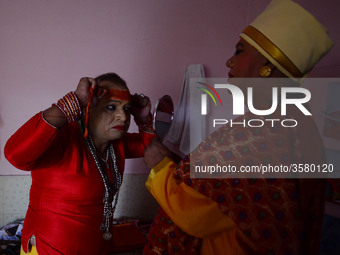 In This Picture taken on October 28, 2018, Pavitra Nimbhorker, Second head of Kinnar (Transgender) Akhara (A hindu religious group) gets rea...