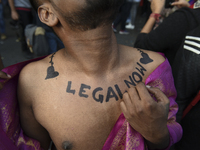 Member and supporter of the lesbian, gay, bisexual, transgender and queer (LGBTQ) community flaunts his body art at New Delhi's Queer Pride...