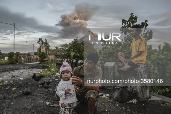 Mount Mayon makes a mild eruption as seen from Daraga, Albay province, Philippines, January 25, 2018. Mount Mayon, the Philipines' most acti...