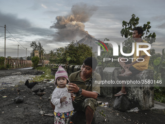 Mount Mayon makes a mild eruption as seen from Daraga, Albay province, Philippines, January 25, 2018. Mount Mayon, the Philipines' most acti...