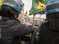 Italy, Rome:Italian policemen face pro-Kurdish demonstrators during a sit-in near the Vatican in Rome, Monday, Feb. 5, 2018.Turkish Presiden...