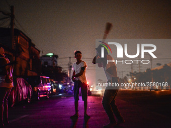 Flagellants whip their backs during Good Friday Lenten rites in Navotas, Metro Manila, Philippines, March 30, 2018.

Photo: Ezra Acayan/NurP...