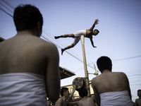 HIDA, JAPAN - APRIL 19 : Men in loincloths performs a ritual for good luck to residents during the Furukawa Festival in Hida City, Gifu pref...