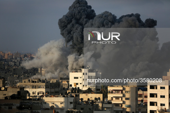 A picture taken on August 9, 2018 shows a smoke billowing during an Israeli air strike on Gaza City. - Gaza militants halted fire on August...