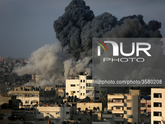 A picture taken on August 9, 2018 shows a smoke billowing during an Israeli air strike on Gaza City. - Gaza militants halted fire on August...