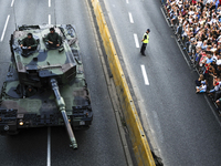 Military are seen parading along the Vistula river in Warsaw, Poaldn on August 15, 2018 on Armed Forces Day. In 2018 Poland celebrates its 1...