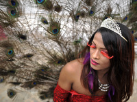 A Member of Nepalese Lesbian, Gay, Bisexual and Transgender (LGBT) pose for the photos in a LGBT pride parade during Gai Jatra Festival cele...