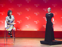 Liz Bacelar and Sophia the robot as a special guest of the Impact’18 congress held in ICE Congress Centre. Krakow, Poland on 13 June, 2018....