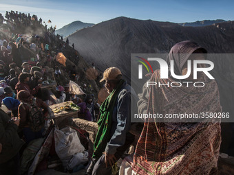  Villagers waiting for Tenggerese sacrifation that thrown to the volcano during Yadnya Kasada Festival at Mount Bromo, Probolinggo, East Jav...