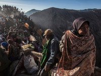  Villagers waiting for Tenggerese sacrifation that thrown to the volcano during Yadnya Kasada Festival at Mount Bromo, Probolinggo, East Jav...