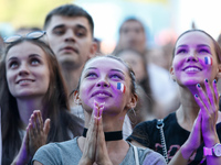 France supporters celebrate after the FIFA World Cup 2018 final match between France and Croatia on July 15, 2018 at Fan Fest zone in Saint...