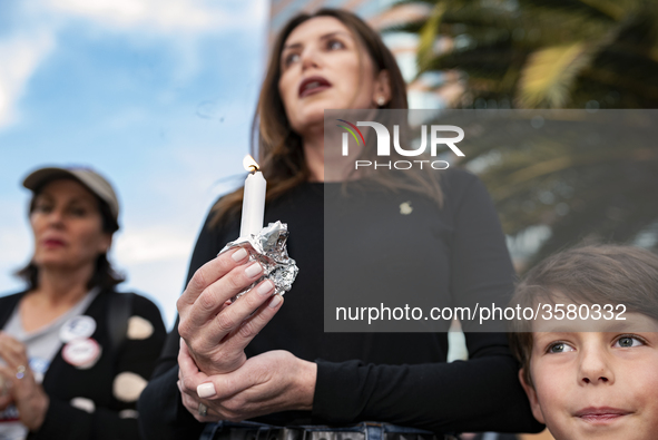 People gather for an interfaith vigil for the victims of the shooting in the Tree of Life Synagogue in Pittsburgh. Los Angeles, California o...