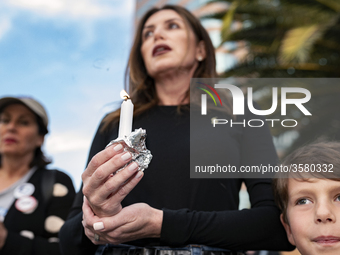 People gather for an interfaith vigil for the victims of the shooting in the Tree of Life Synagogue in Pittsburgh. Los Angeles, California o...