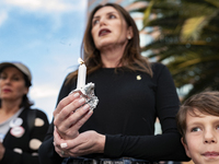 People gather for an interfaith vigil for the victims of the shooting in the Tree of Life Synagogue in Pittsburgh. Los Angeles, California o...