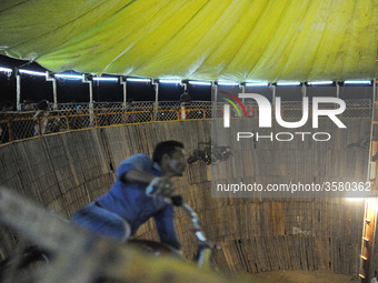 Motorcycle stuntman shows skills by riding a motorcycle inside the Well of Death during a fair in Kathmandu on Monday, October 08, 2018. (