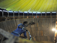 Motorcycle stuntman shows skills by riding a motorcycle inside the Well of Death during a fair in Kathmandu on Monday, October 08, 2018. (