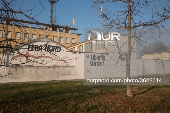 A view of the wall of historic headquarters of the Lega Nord in Via Bellerio in Milan, vandalized by murals insults, in Milan, Italy, on Jan...