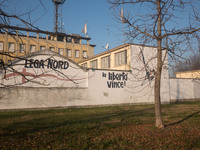 A view of the wall of historic headquarters of the Lega Nord in Via Bellerio in Milan, vandalized by murals insults, in Milan, Italy, on Jan...