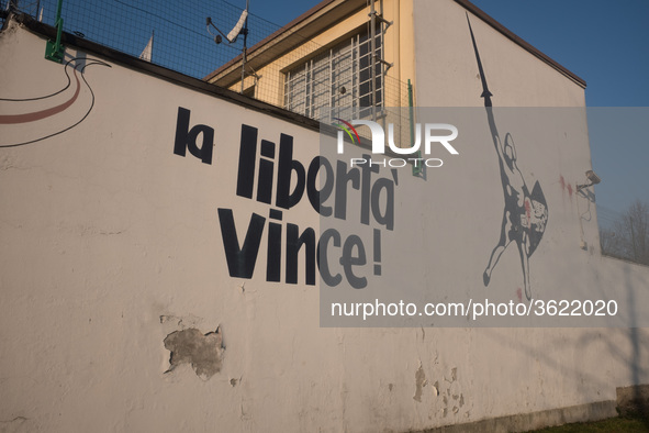 A view of the wall of historic headquarters of the Lega Nord in Via Bellerio in Milan, vandalized by murals insults, in Milan, Italy, on Jan...