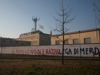 A view of the wall of historic headquarters of the Lega Nord in Via Bellerio in Milan, vandalized by murals insults, in Milan, Italy, on Jan...