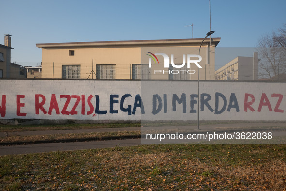 A view of the wall of historic headquarters of the Lega Nord in Via Bellerio in Milan, vandalized by murals insults, in Milan, Italy, on Jan...