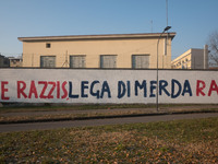 A view of the wall of historic headquarters of the Lega Nord in Via Bellerio in Milan, vandalized by murals insults, in Milan, Italy, on Jan...