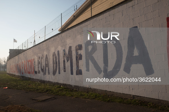 A view of the wall of historic headquarters of the Lega Nord in Via Bellerio in Milan, vandalized by murals insults, in Milan, Italy, on Jan...