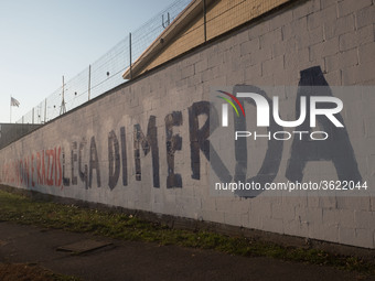 A view of the wall of historic headquarters of the Lega Nord in Via Bellerio in Milan, vandalized by murals insults, in Milan, Italy, on Jan...