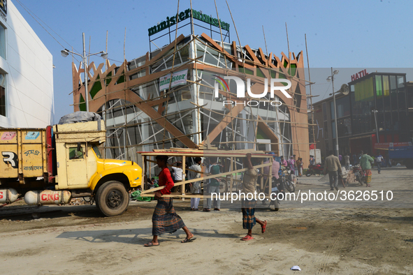 Bangladeshi day labor works in the Dhaka International Trade Fair in Dhaka, Bangladesh. On January 08, 2019. 