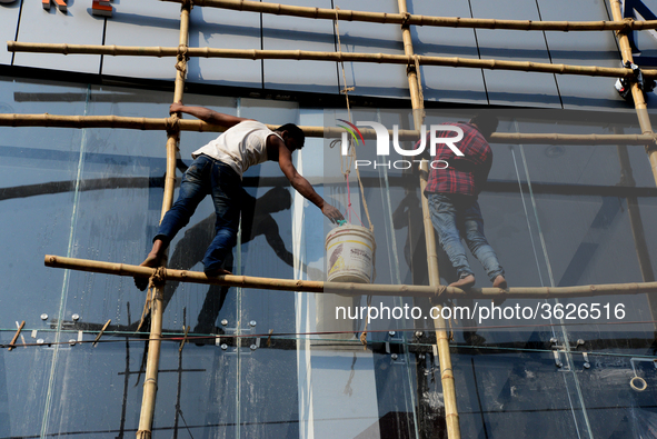 Bangladeshi day labor works in the Dhaka International Trade Fair in Dhaka, Bangladesh. On January 08, 2019. 