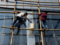 Bangladeshi day labor works in the Dhaka International Trade Fair in Dhaka, Bangladesh. On January 08, 2019. (