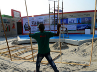 Bangladeshi day labor works in the Dhaka International Trade Fair in Dhaka, Bangladesh. On January 08, 2019. (