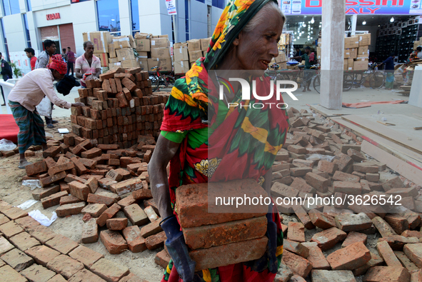 Bangladeshi day labor works in the Dhaka International Trade Fair in Dhaka, Bangladesh. On January 08, 2019. 