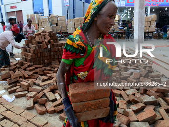 Bangladeshi day labor works in the Dhaka International Trade Fair in Dhaka, Bangladesh. On January 08, 2019. (