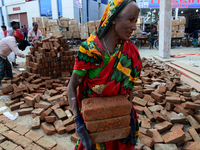 Bangladeshi day labor works in the Dhaka International Trade Fair in Dhaka, Bangladesh. On January 08, 2019. (