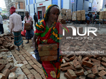 Bangladeshi day labor works in the Dhaka International Trade Fair in Dhaka, Bangladesh. On January 08, 2019. (