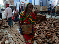 Bangladeshi day labor works in the Dhaka International Trade Fair in Dhaka, Bangladesh. On January 08, 2019. (