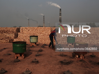 Brickfield workers are works in brickfields Narayanganj near Dhaka Bangladesh on January 12, 2019. (