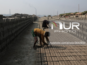 Children women brickfield workers are works in brickfields Narayanganj near Dhaka Bangladesh on January 12, 2019. (