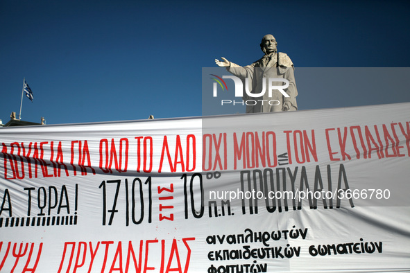 Greek school teachers protest outside the National and Kapodistrian University of Athens, in Greece on January 17, 2019. Teachers and studen...