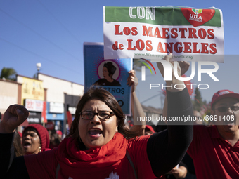 Striking teachers with the Los Angeles Unified School District and supporters of public education march in a parade honoring Dr. Martin Luth...