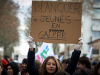 A student holds a placard reading 'Blanquer= youth in distress'. Several schoolteachers unions and two students unions (UNL, FIDL) called fo...