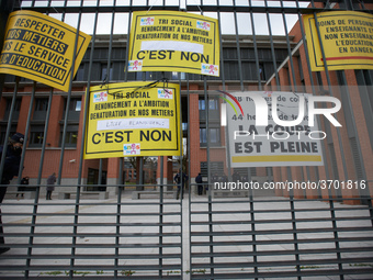 Teachers has put placards on the metal gates of the Local Board Education of toulouse. Several schoolteachers unions and two students unions...